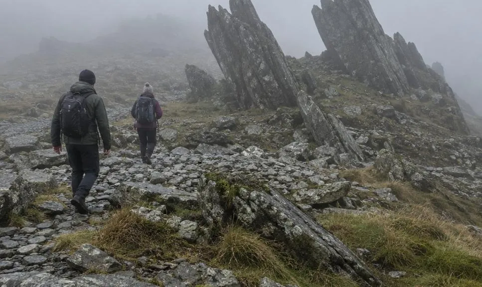 The claw-like rock formations on the summit plateau of Glyder Fawr in cloud.