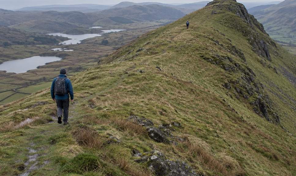 The long whaleback ridge of Cnicht from partway along it, with the summit at its far end.
